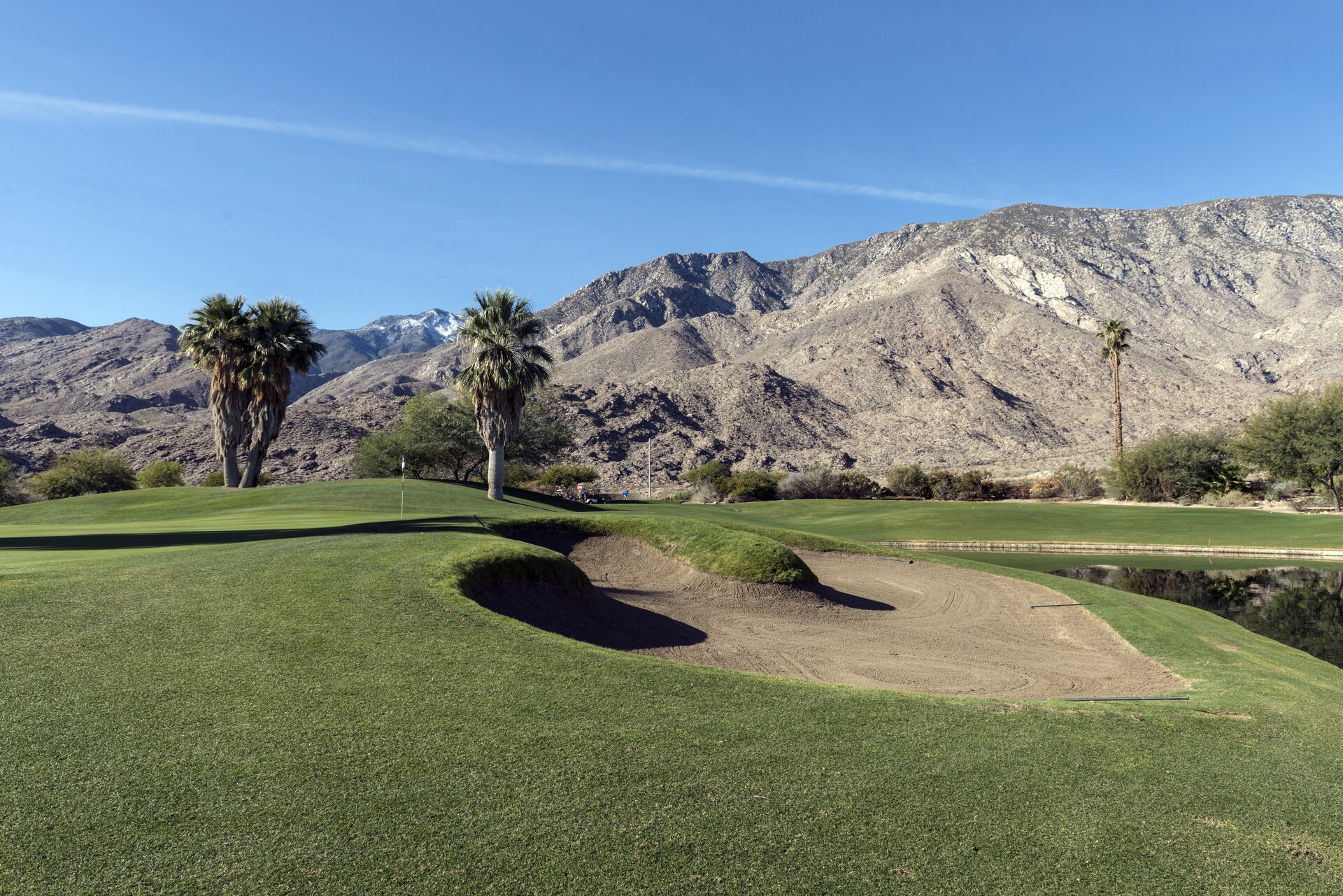 A green and bunker at Indian Canyons Golf Resort in Palm Springs.